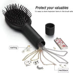 Brosse à cheveux secrète avec compartiment caché contenant chaînes, bijoux, boucles d’oreilles et petits objets de valeur.
