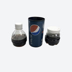 Bouteille Pepsi secrète ouverte montrant le compartiment caché pour ranger argent, bijoux ou petits objets de valeur.