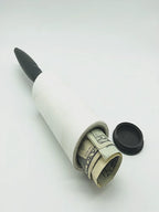 Lint roller avec compartiment caché ouvert contenant des billets de banque — cachette secrète pour ranger de l’argent discrètement